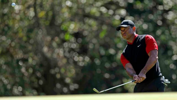 Tiger Woods watches a pitch shot in the final round of the 2023 Genesis Invitational.